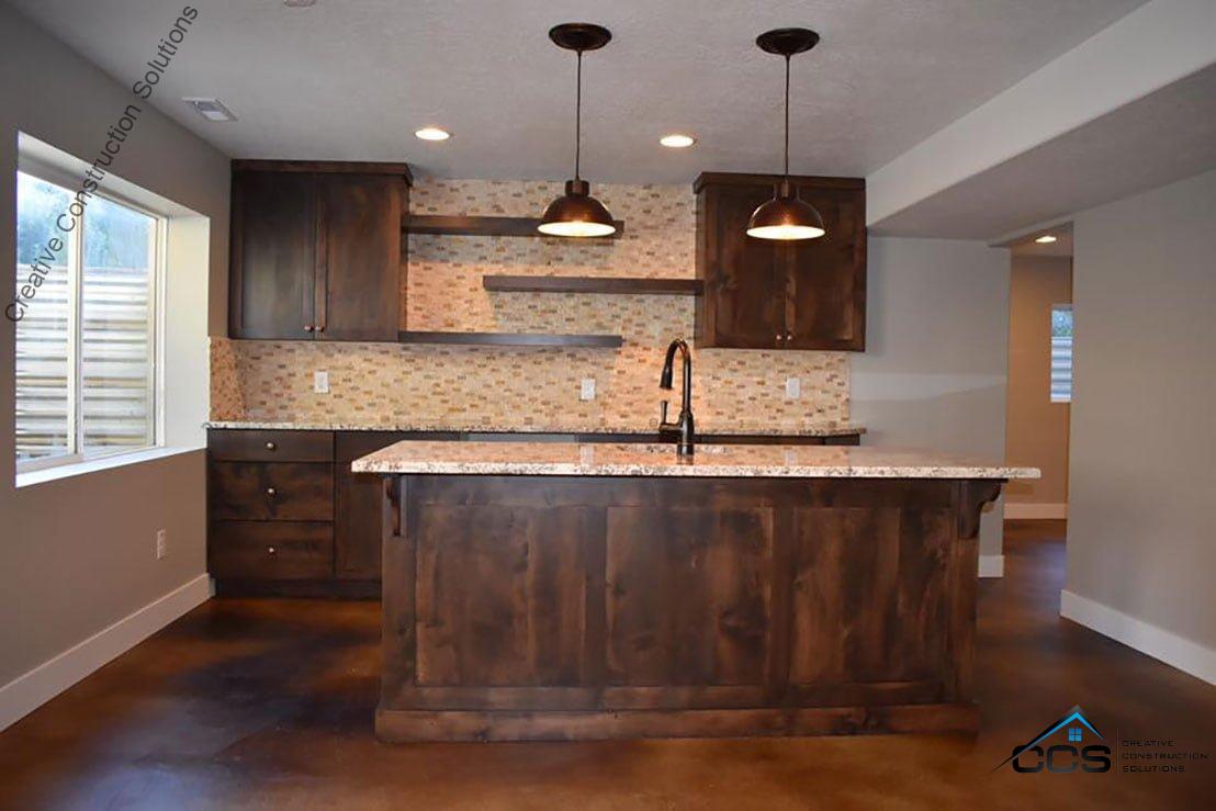 Creative Construction Solutions of Utah finished basement kitchenettes bars.